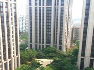 Beijing Ya Ju Hotel Apartment Bagian luar foto